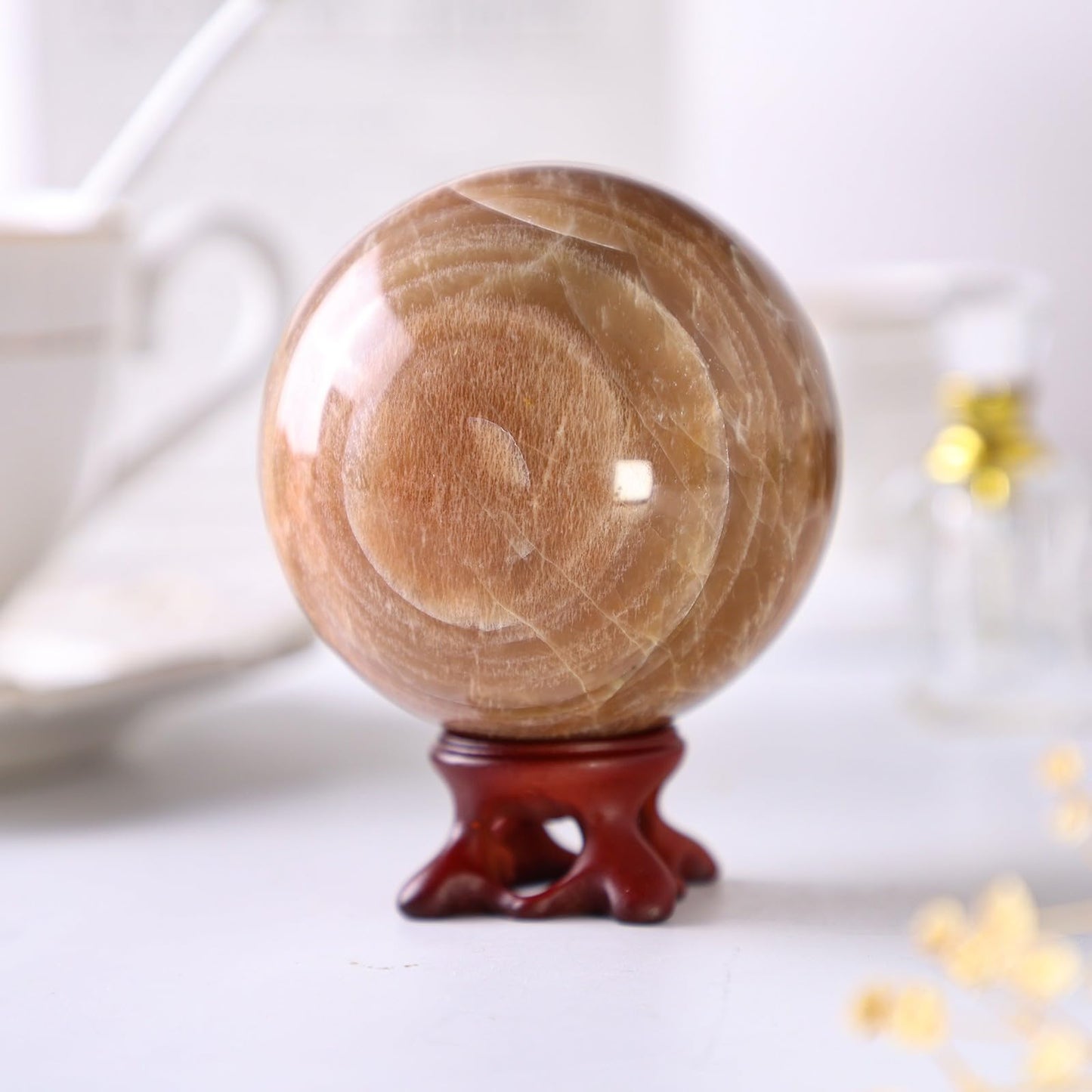 TUMBEELLUWA Orange Moonstone Crystal Ball with Stand for Fortune Teller Witchcraft Divination, Decorative Gemstone Sphere for Home Decor, 71-80 mm