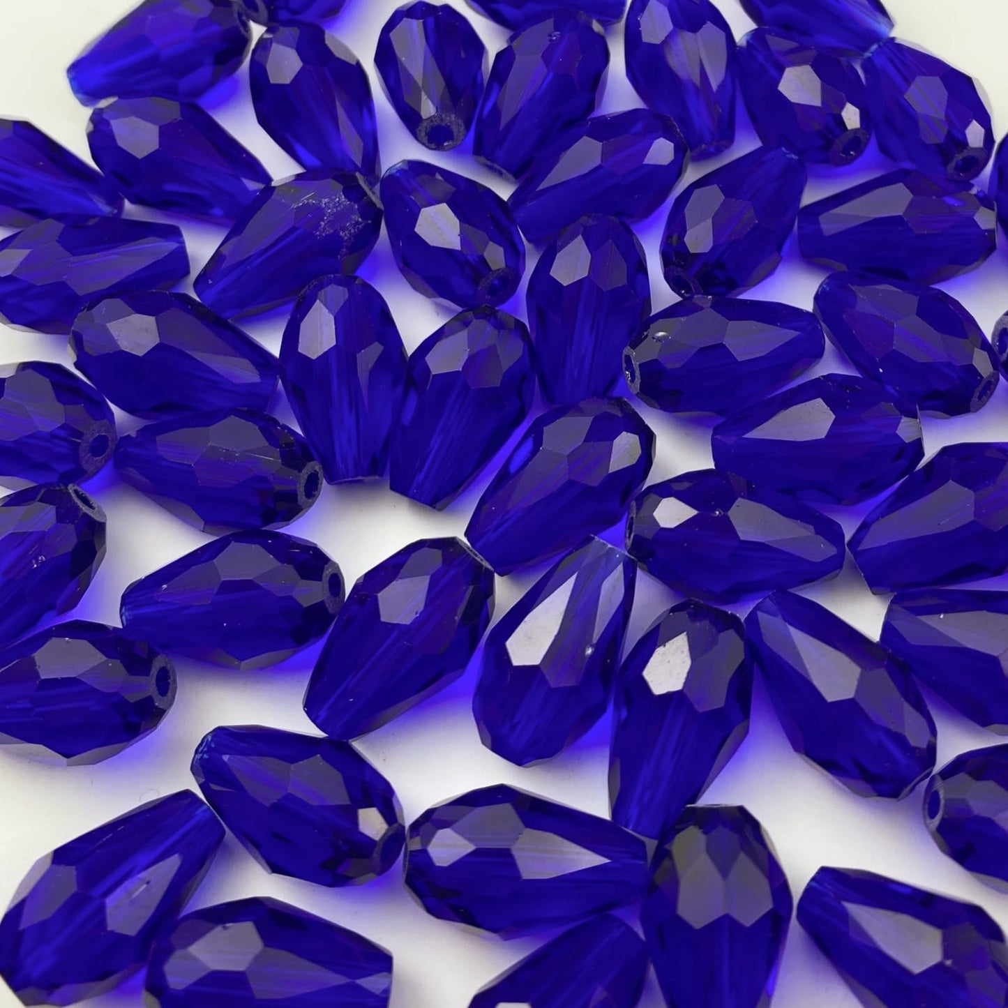 Honkoolly 100pcs 8x12mm Teardrop Crystal Glass Beads Vertical Hole Faceted Glass Teardrop Spacer Beads for Bracelets Necklace Earring DIY Jewelry Making Craft(Sapphire Blue)