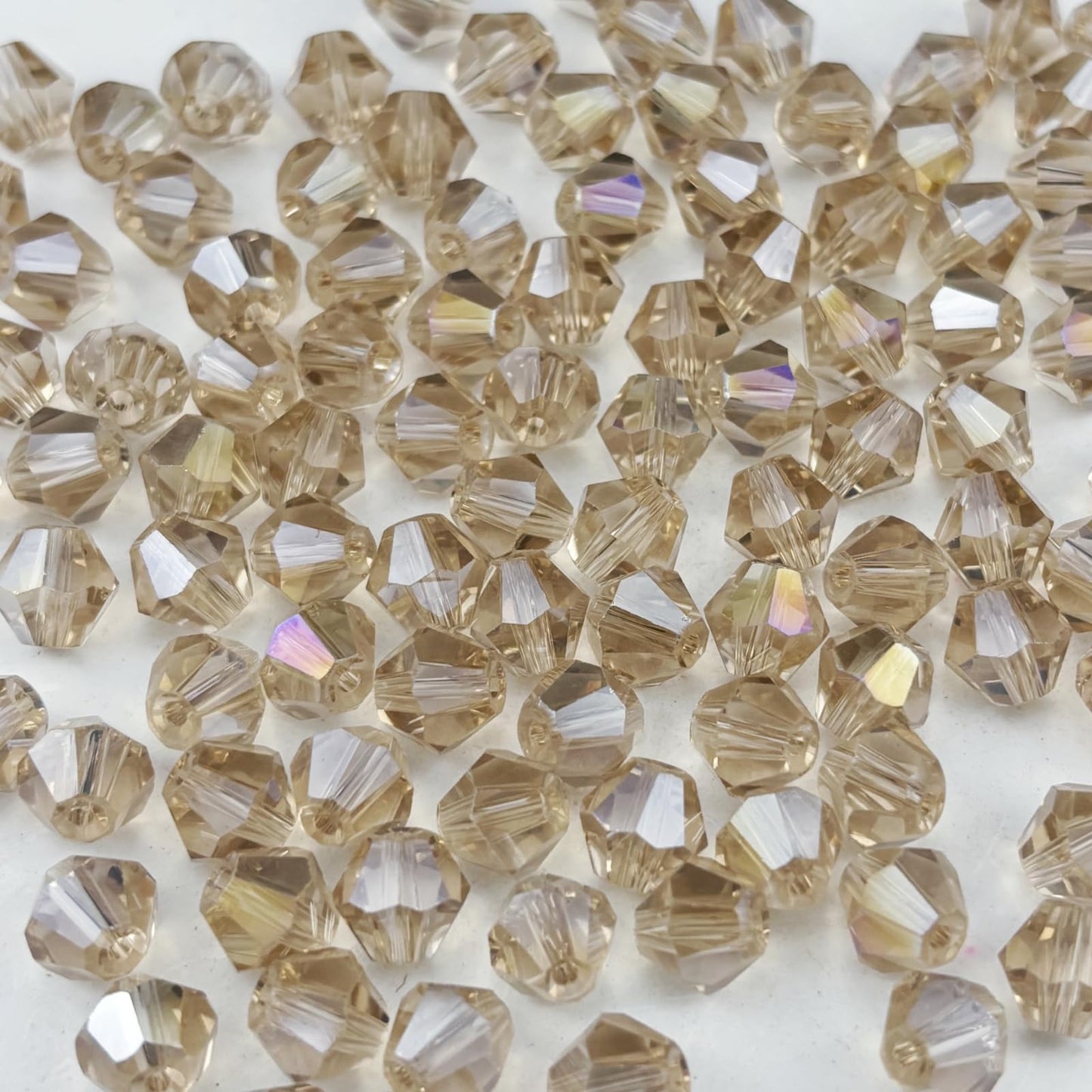 Pinhoollgo 600pcs 3mm Bicone Crystal Glass Beads Faceted Bicone Crystal Beads Bulk Glass Spacer Beads for Bracelets Necklace Pendants Earrings DIY Jewelry Craft Making(Champagne AB)