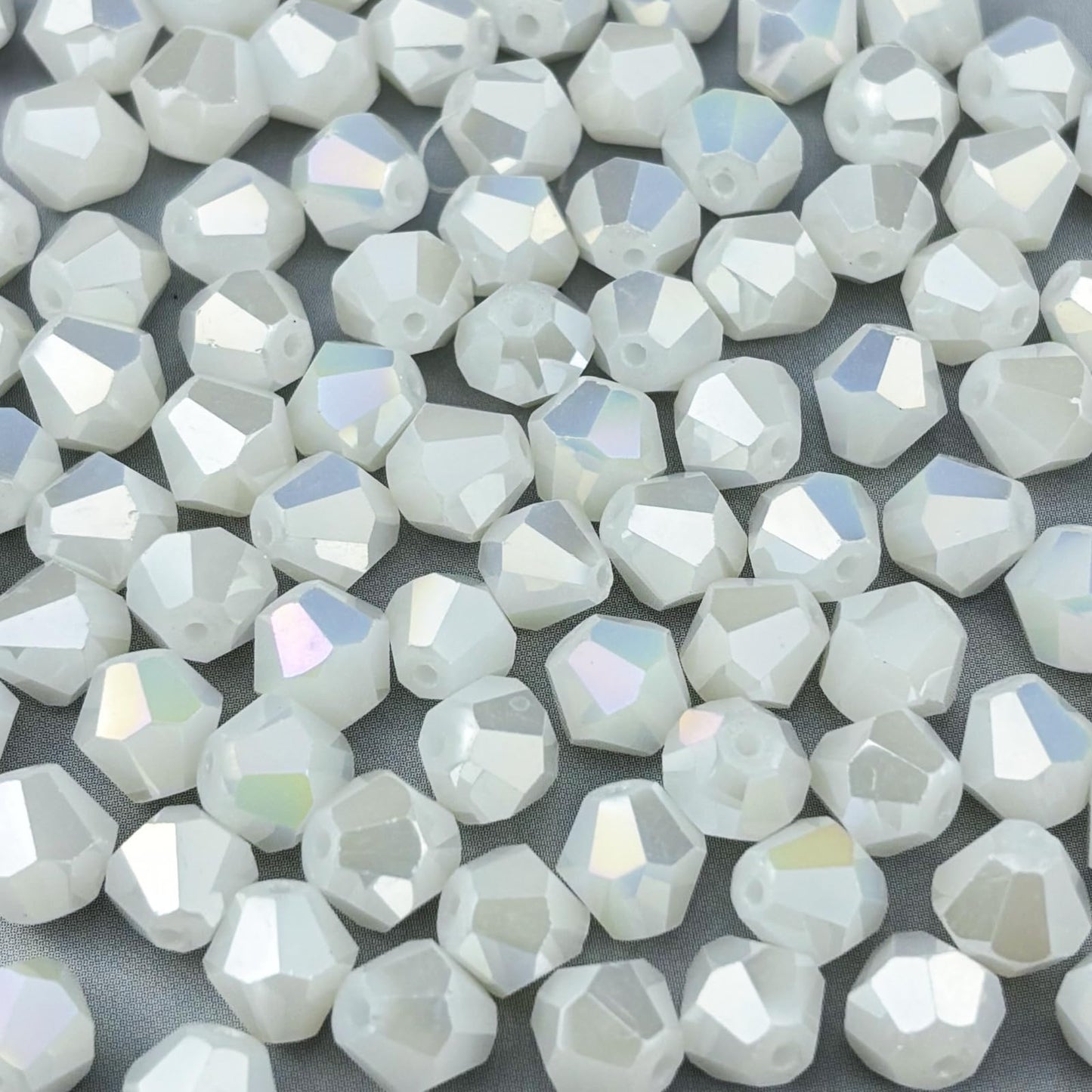 Pinhoollgo 600pcs 3mm Bicone Crystal Glass Beads Faceted Bicone Crystal Beads Bulk Glass Spacer Beads for Bracelets Necklace Pendants Earrings DIY Jewelry Craft Making(White Jade AB)