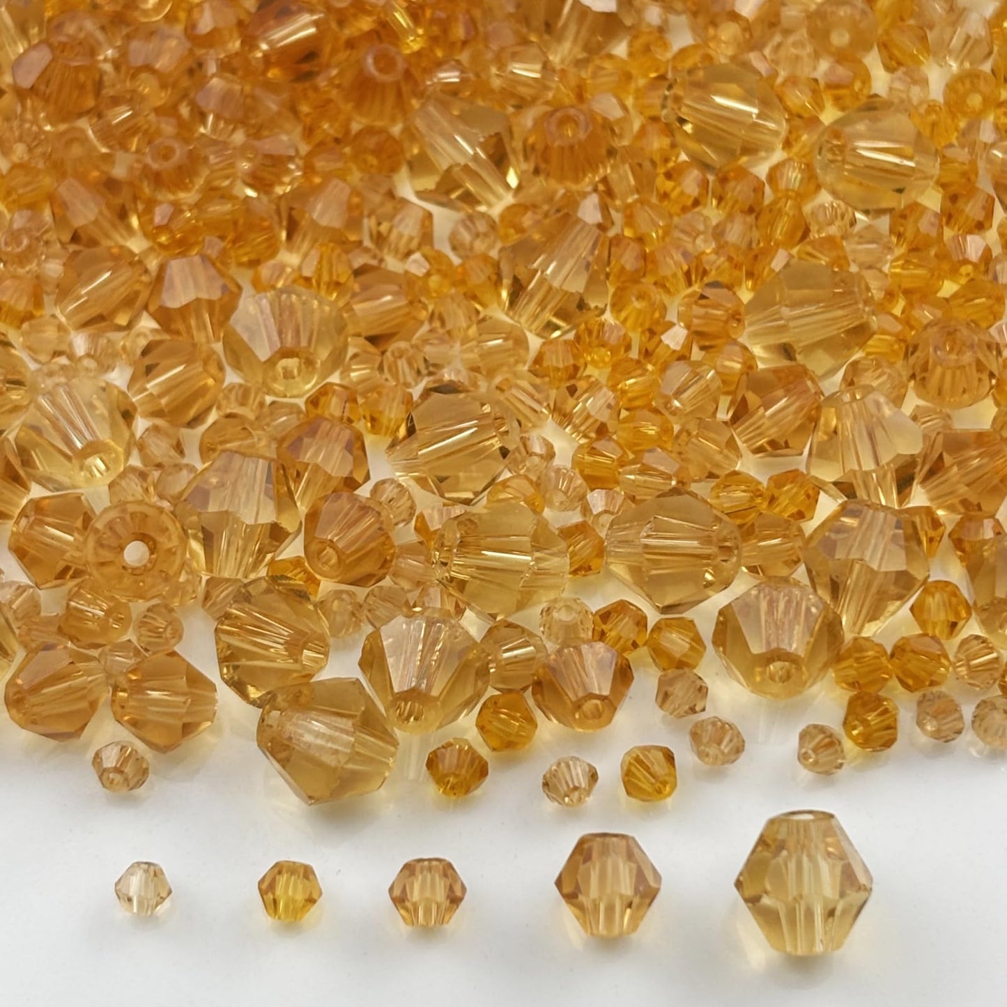 Pinhoollgo 1310pcs Bicone Crystal Glass Beads 2mm 3mm 4mm 6mm 8mm Faceted Crystal Spacer Beads for Bracelets Necklace Pendants Earrings DIY Jewelry Craft Making(Gold Champagne)