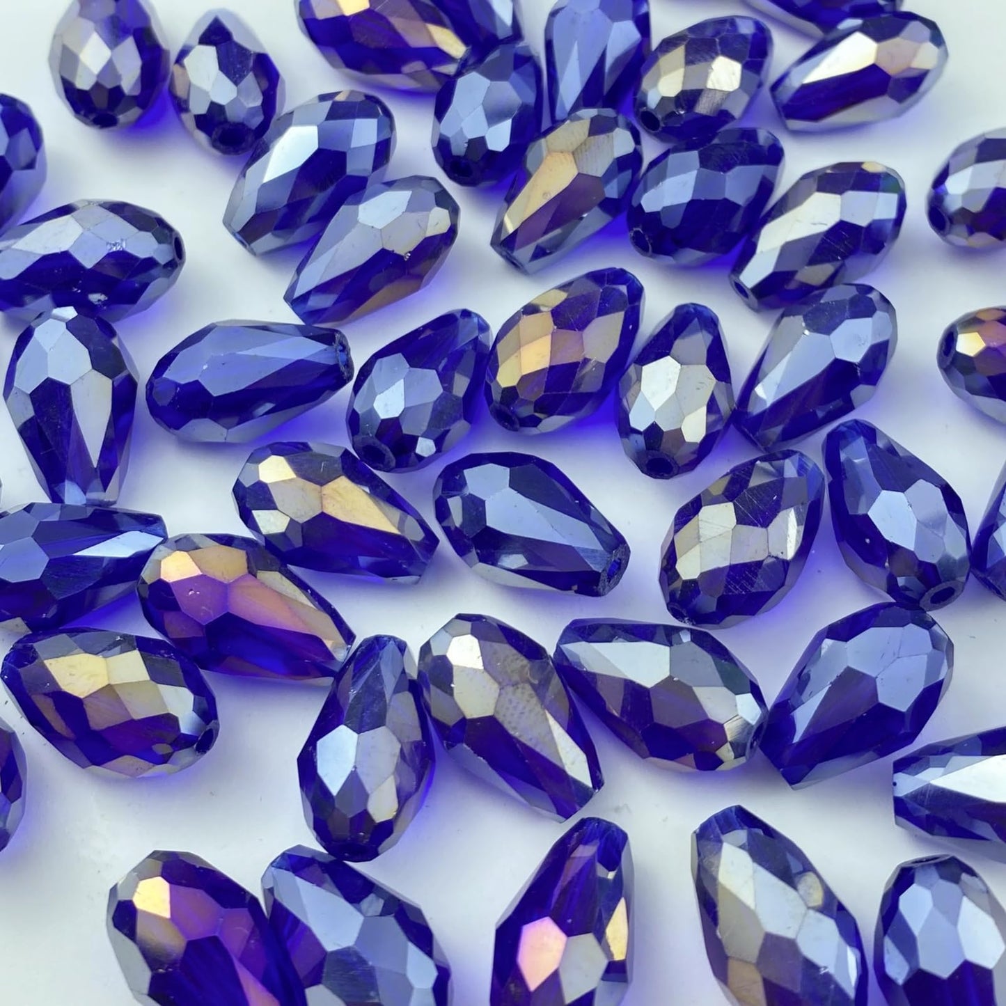 Honkoolly 130pcs 6x8mm Teardrop Crystal Glass Beads Vertical Hole Faceted Glass Teardrop Spacer Beads for Bracelets Necklace Earring DIY Jewelry Making Craft(Sapphire Blue AB)
