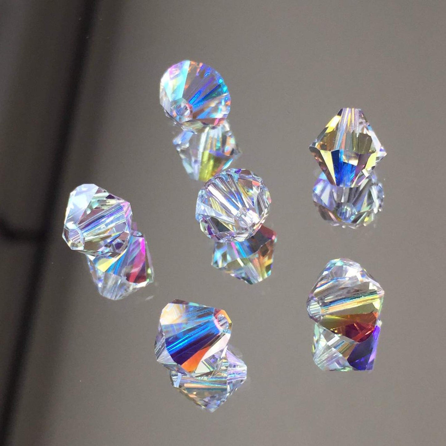Dowarm 250PCS Bicone Crystal Beads 6MM, Faceted Bicone Glass Beads for Jewelry Craft Making, DIY Bracelet, Necklace, Dolls, Loose Spacer Beads (Crystal AB, 6MM)