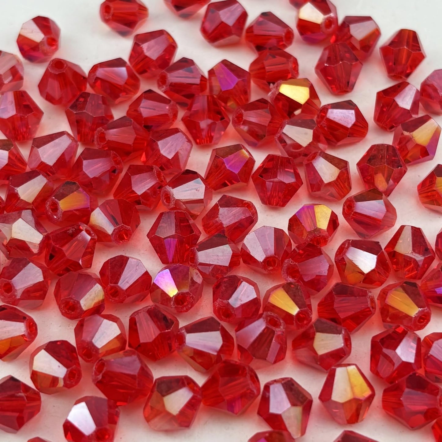 Pinhoollgo 500pcs 4mm Bicone Crystal Glass Beads Faceted Bicone Crystal Beads Bulk Glass Spacer Beads for Bracelets Necklace Pendants Earrings DIY Jewelry Craft Making(Red AB)