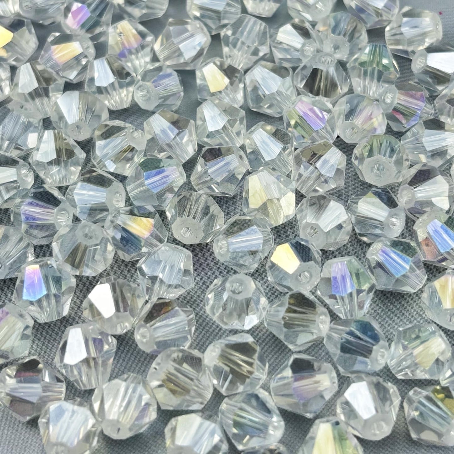 Pinhoollgo 200pcs 6mm Bicone Crystal Glass Beads Faceted Bicone Crystal Beads Bulk Glass Spacer Beads for Bracelets Necklace Pendants Earrings DIY Jewelry Craft Making(Transparent AB)
