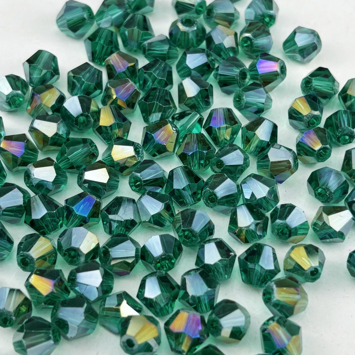 Pinhoollgo 100pcs 8mm Bicone Crystal Glass Beads Faceted Bicone Crystal Beads Bulk Glass Spacer Beads for Bracelets Necklace Pendants Earrings DIY Jewelry Craft Making(Peacock Green AB)
