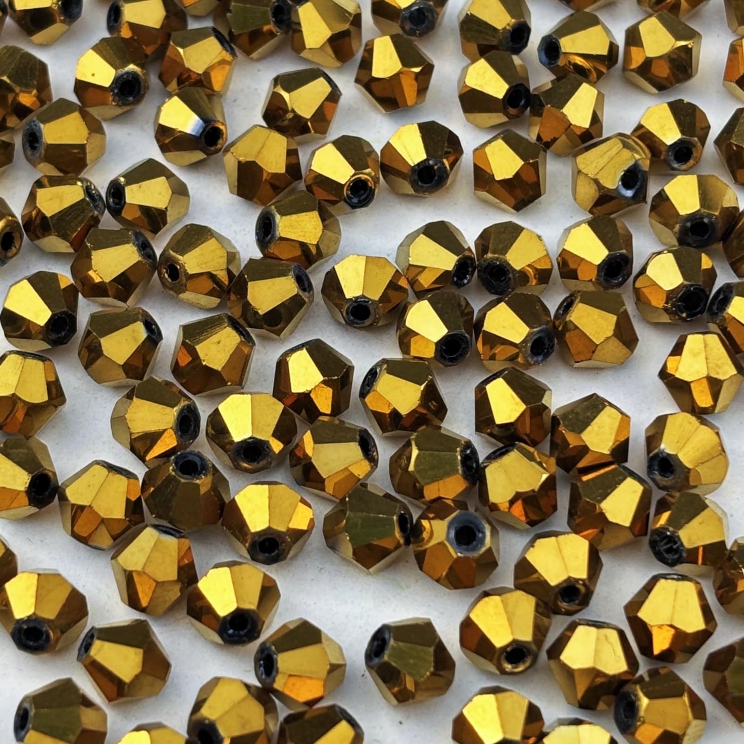 YUEXIGO 200pcs 6mm Bicone Glass Crystal Beads for Jewelry Making, Faceted Bicone Glass Spacer Beads for Bracelet Earring Necklace DIY Craft(Gold)