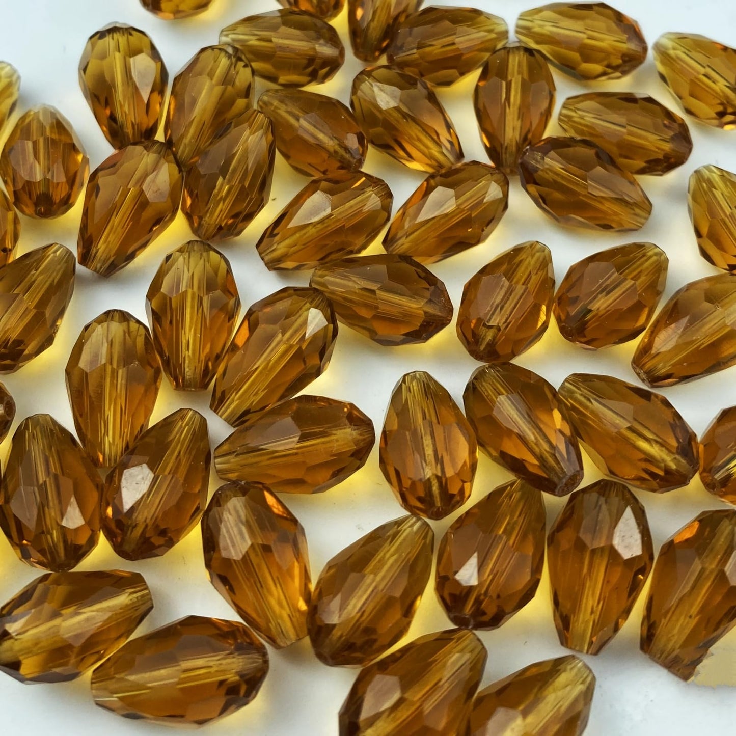 Honkoolly 100pcs 8x12mm Teardrop Crystal Glass Beads Vertical Hole Faceted Glass Teardrop Spacer Beads for Bracelets Necklace Earring DIY Jewelry Making Craft(Amber)