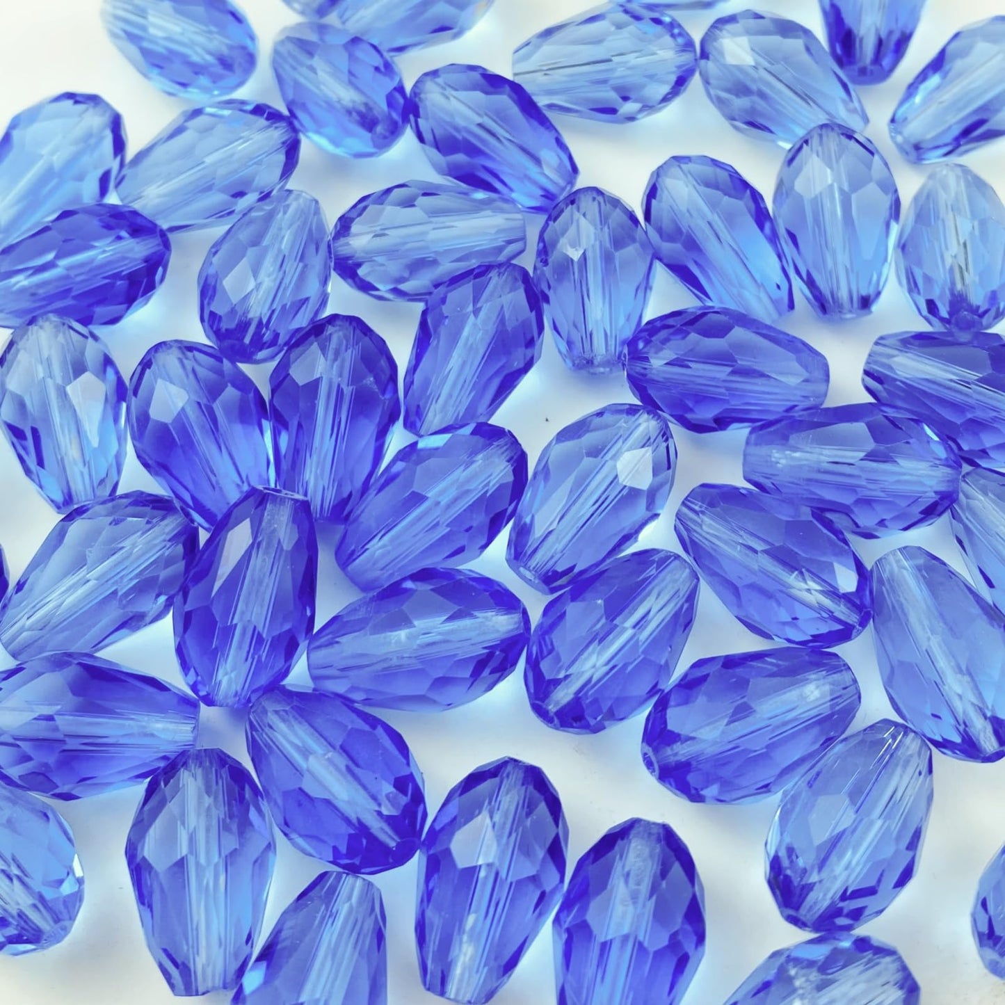 Honkoolly 200pcs 4x6mm Teardrop Crystal Glass Beads Vertical Hole Faceted Glass Teardrop Spacer Beads for Bracelets Necklace Earring DIY Jewelry Making Craft(Light Blue)