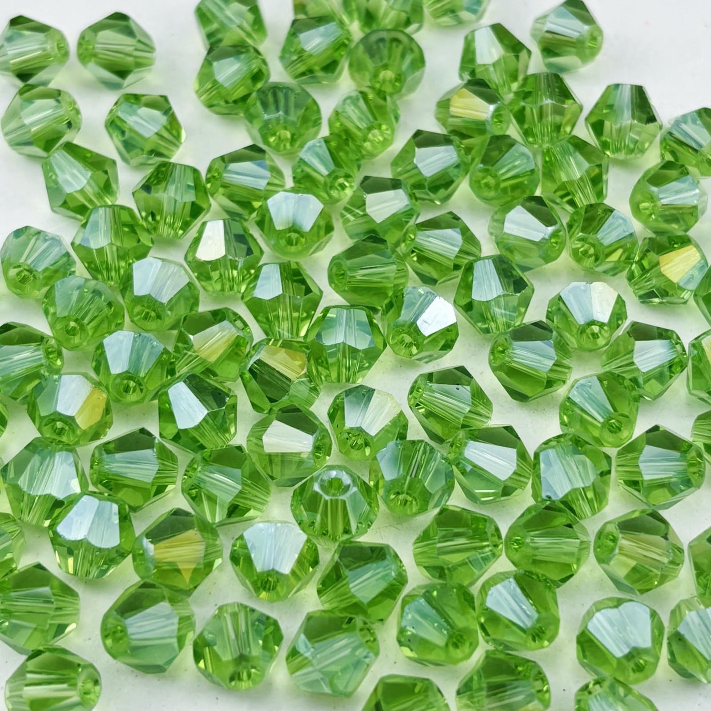 Pinhoollgo 600pcs 3mm Bicone Crystal Glass Beads Faceted Bicone Crystal Beads Bulk Glass Spacer Beads for Bracelets Necklace Pendants Earrings DIY Jewelry Craft Making(Light Green AB)